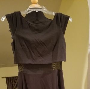 Flirty black dress with mesh center.